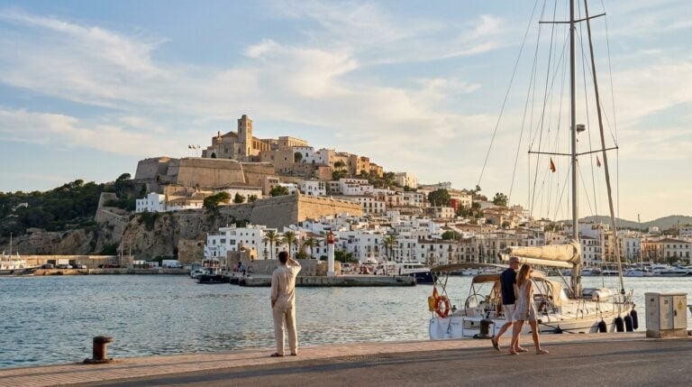 View from the harbor of the historic Dalt Vila old town on a hill in Ibiza, Spain.