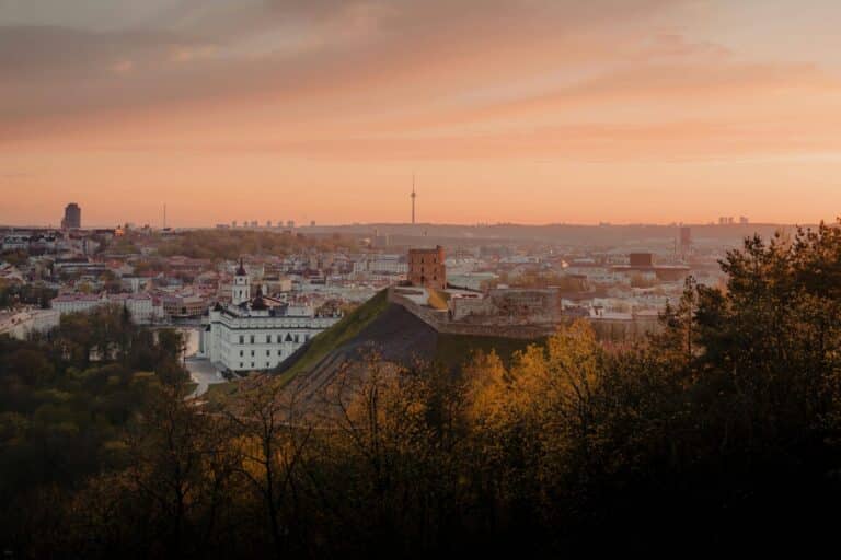 An evening view over the city of Vilnius, with Gediminas' Tower on Castle Hill in the center.