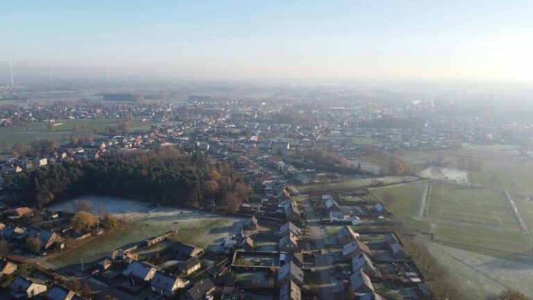 Aerial view over a residential area of Ypres, Belgium on a hazy and frosty morning.