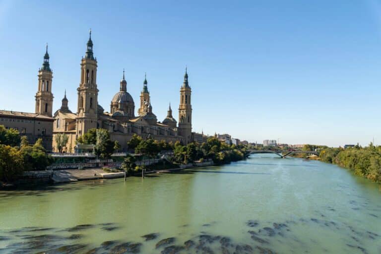 The impressive Basilica of Our Lady of the Pillar stands on the banks of the Ebro River in Zaragoza.