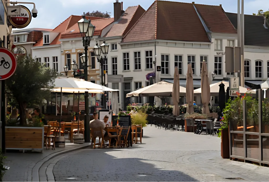 City Game Bergen op Zoom People enjoy the beautiful weather on the terrace in the center of Bergen op Zoom