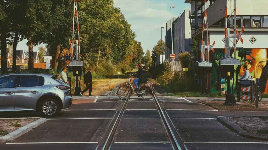City Game Enschede casual picture at Oude Market in Enschede, Netherlands. The train crossing of NS trains.